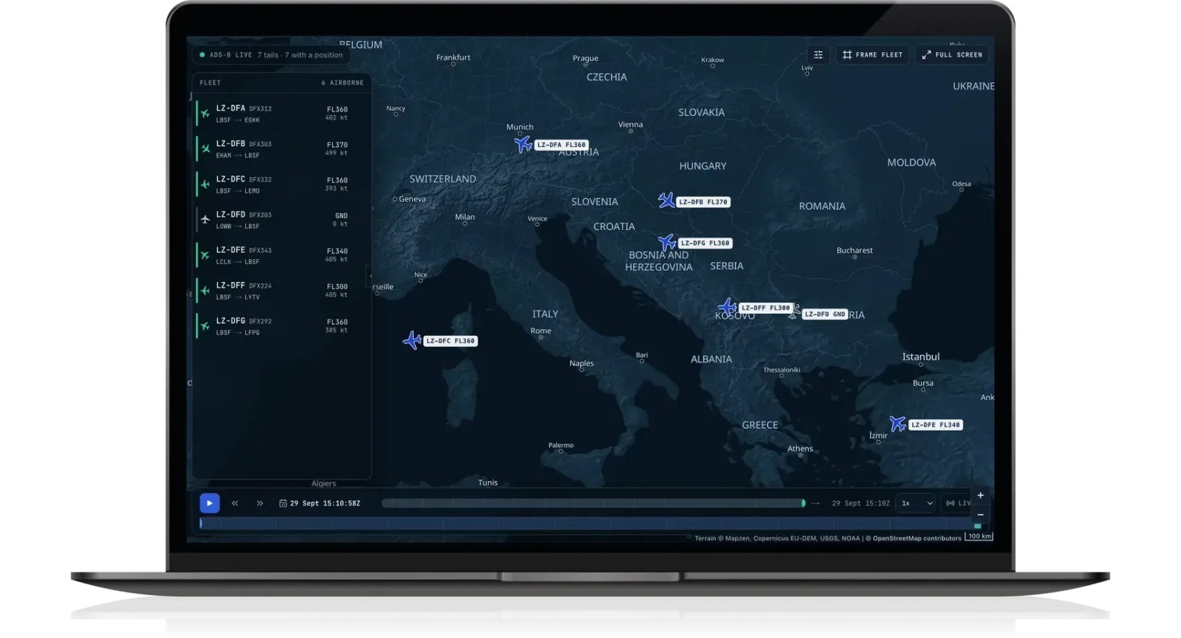 Live Fleet Monitoring in AeroSight FDM v2 on a laptop: the fleet on a near-live map, each aircraft in flight or on the ground